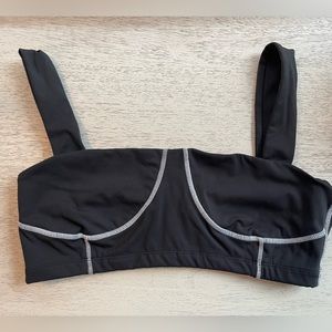 WeWoreWhat black workout top with white stitch detail